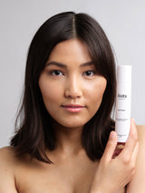 Model with Aivira Day cream in hand