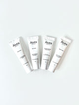 Aivira Skincare travel kit, small sized Day Cream, Eye Cream, Intensive Hydration & Glow Serum and Night Cream on white background